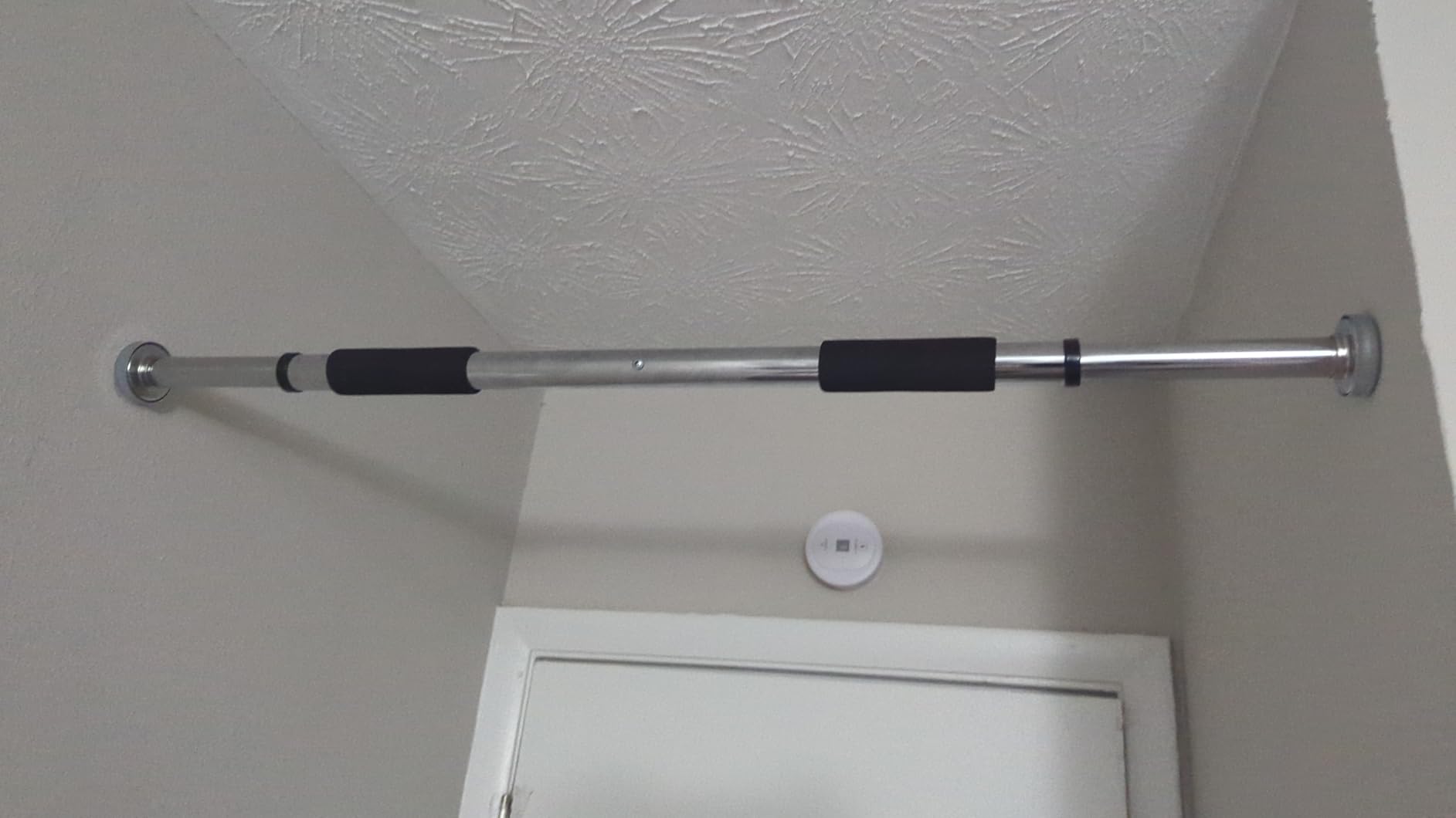 Sunny Health & Fitness Adjustable Doorway Chin Up/Pull Up Bar | Adjustable Doorway Fitment, Strong Steel Frame, Foam Padded Handlebars, Anti-Slip Pads, Ideal for Upper Body Workouts customer photo 2