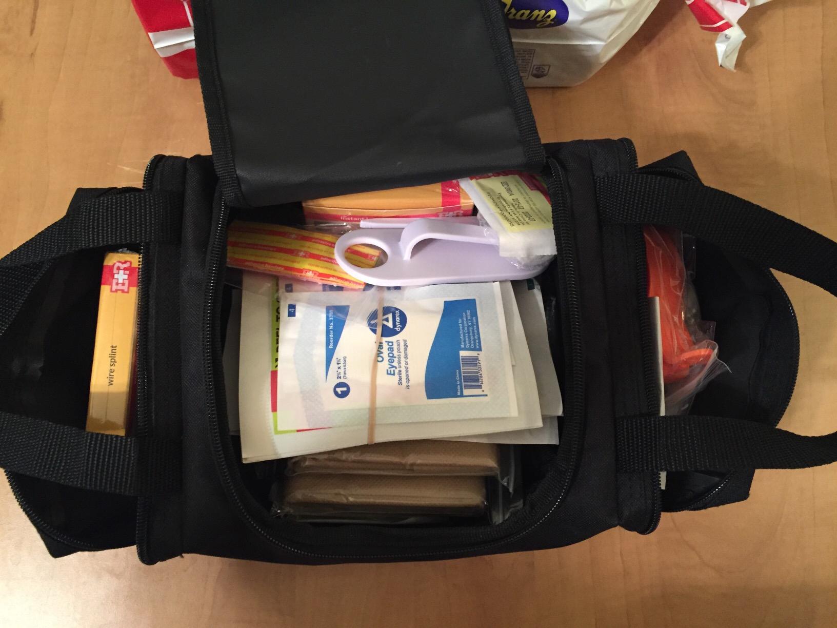 Fully Stocked Trauma First Aid Kit – First Responder II Bag with Tools, Gauze, Bandages, Scissors & Gloves – Compact & Portable – OSHA and ANSI Compliant – Orange customer photo 2