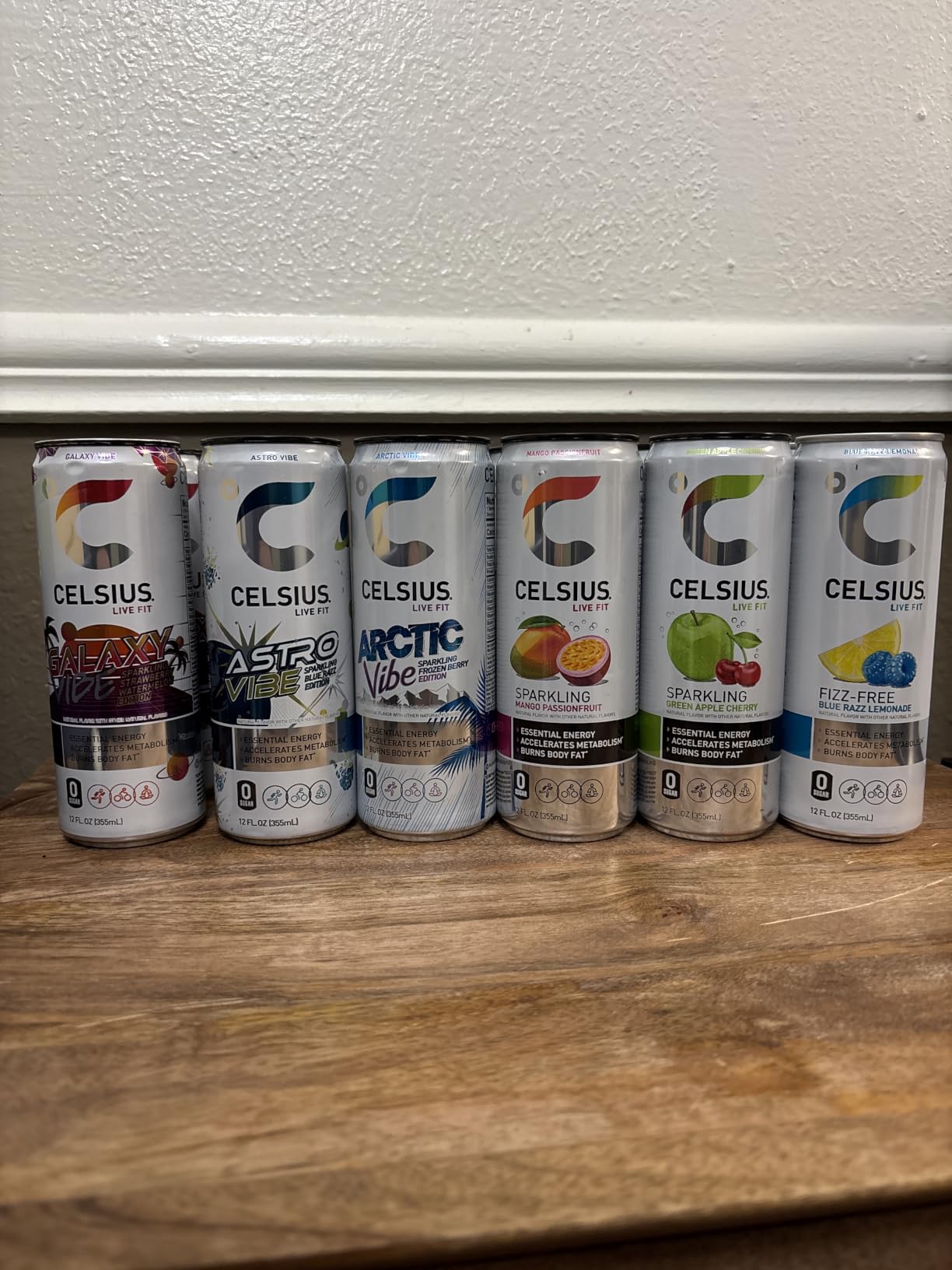 CELSIUS Assorted Flavors Official Variety Pack, Functional Essential Energy Drinks, 12 Fl Oz (Pack of 12) customer photo 1