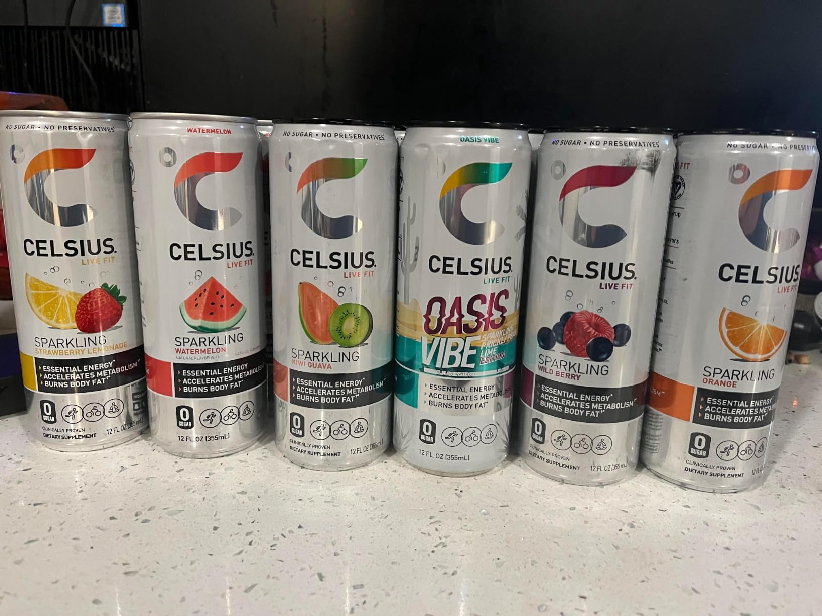 CELSIUS Assorted Flavors Official Variety Pack, Functional Essential Energy Drinks, 12 Fl Oz (Pack of 12) customer photo 2