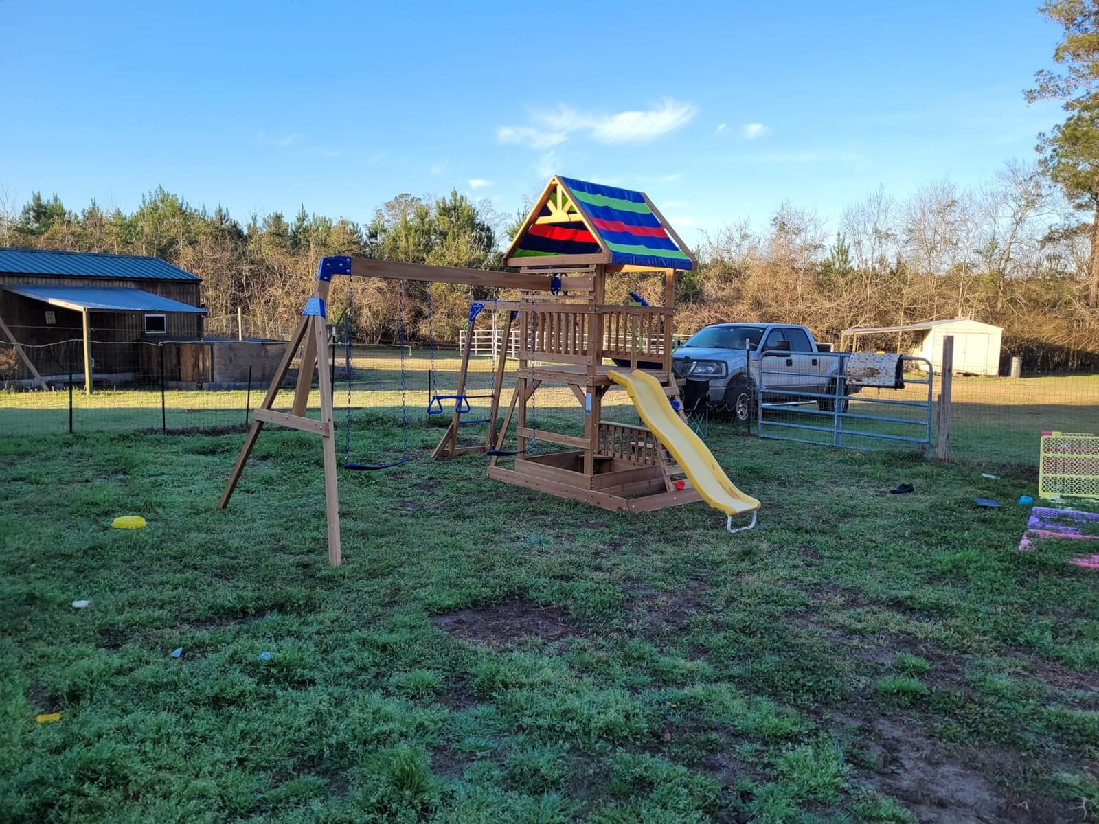 Backyard Discovery Belmont Cedar Wood Swing Set with Wave Slide, Play Deck, Rock Wall Ladder, Snack Bar Window, Shaded Picnic Area, Bench, Belt Swings, Trapeze, Sandbox Area, Canopy, Outdoor Playset customer photo 2
