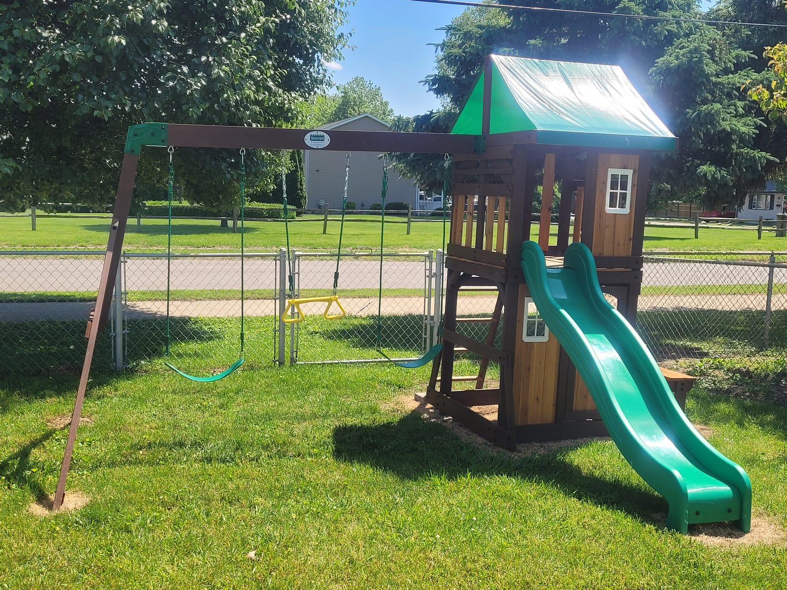 Backyard Discovery Lakewood Cedar Wood Swing Set with Wave Slide, Clubhouse, Playhouse, Snack Bar Window, Picnic Area, Belt Swings, Trapeze, Full Front Door, Windows, Step Ladder, Outdoor Playset customer photo 2
