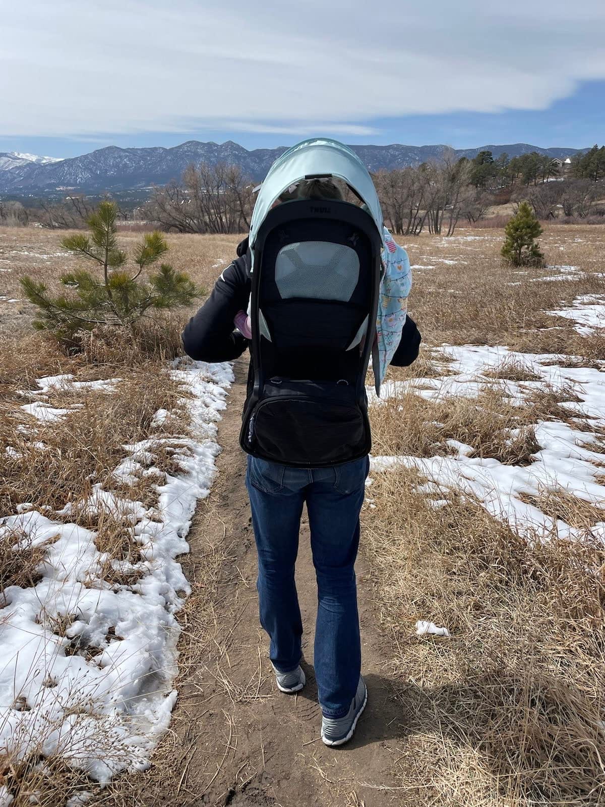 Thule Sapling Child Carrier Backpack - Machine Washable Seat - Self-Standing Frame - Adjustable padded straps for parents - Ergonomic seat with under-leg support for child - UPF 50 Sunshade customer photo 1