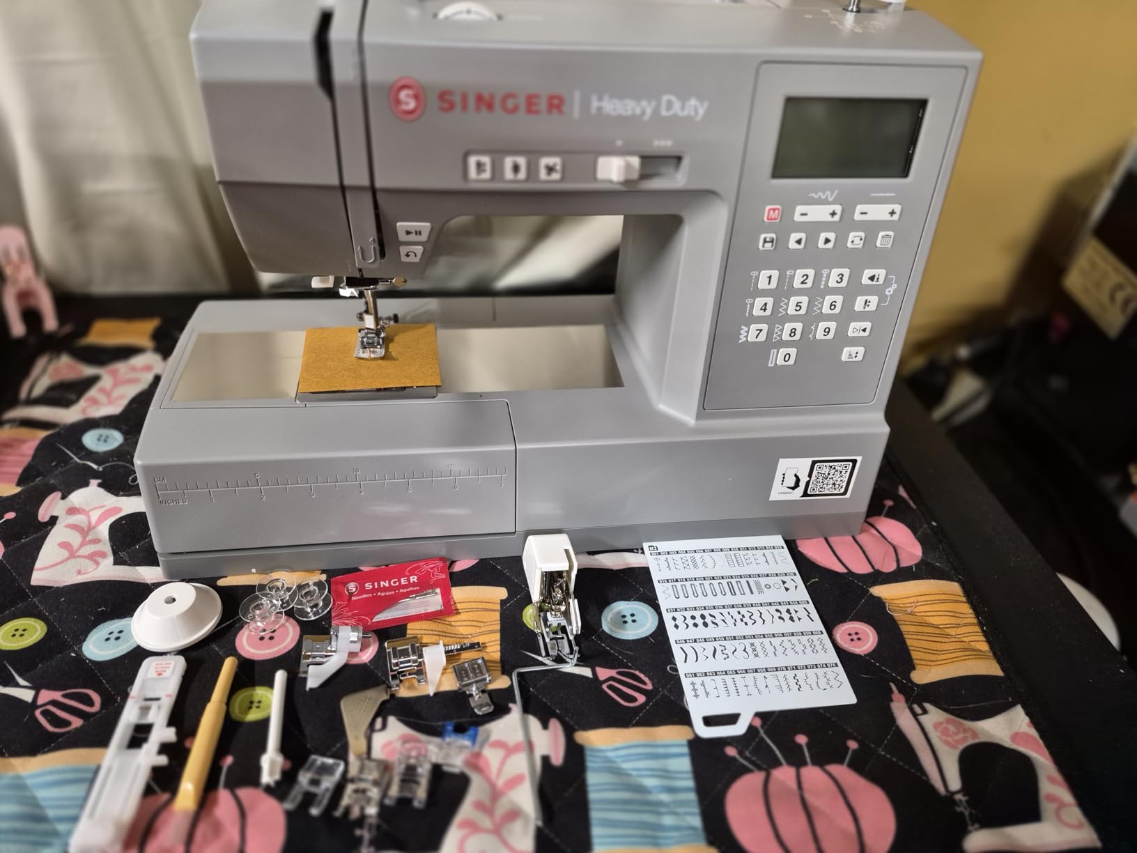 SINGER 6800C Heavy Duty Computerized Sewing Machine with Accessory Kit | 586 stitch applications, LCD screen, lettering font, mirror imaging, LED light, strong motor, metal frame, 1-step buttonhole customer photo 1