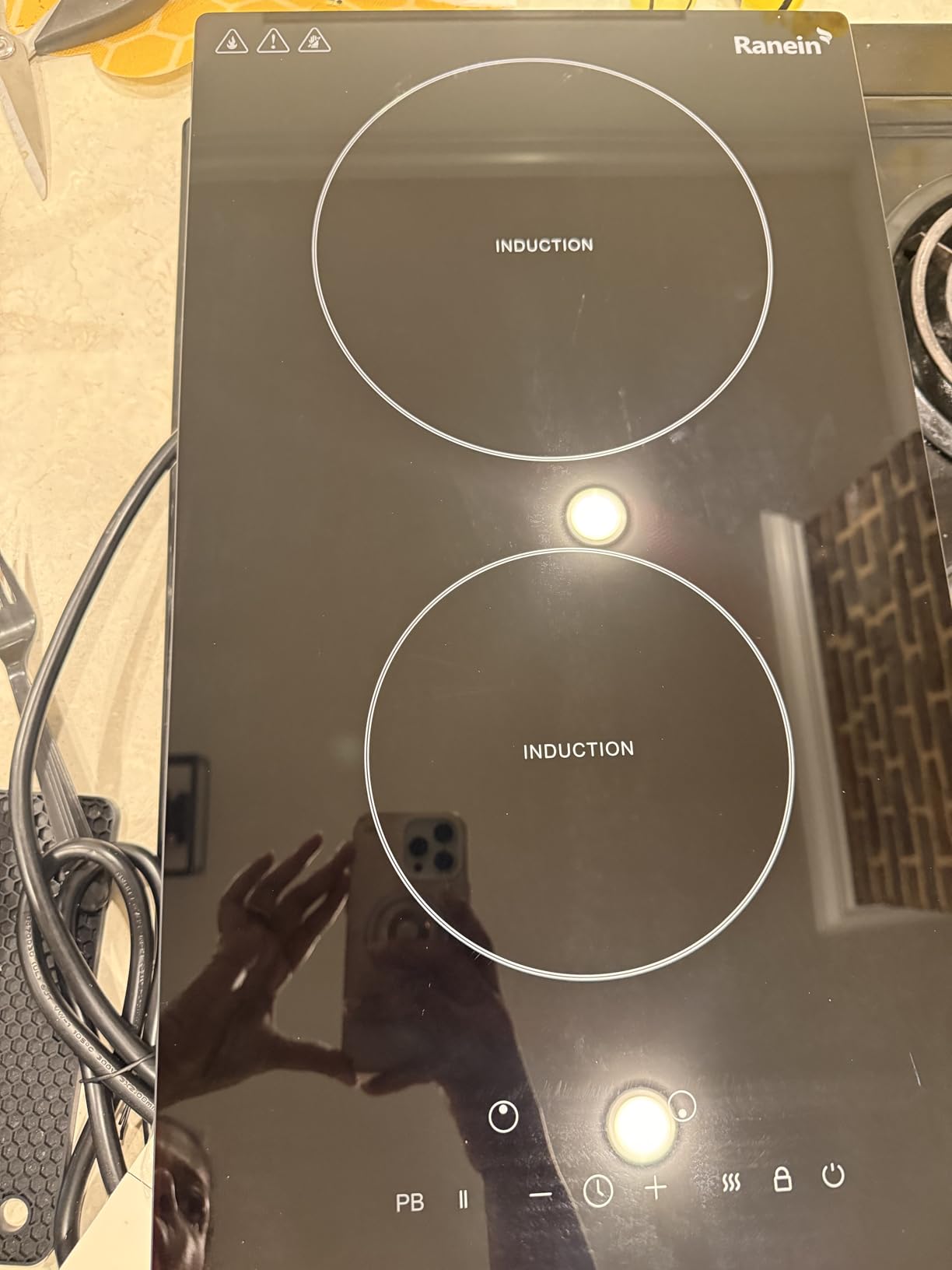 Ranein 30 Inch 4 Burner Induction Cooktop, 7800W, 240V customer photo 1