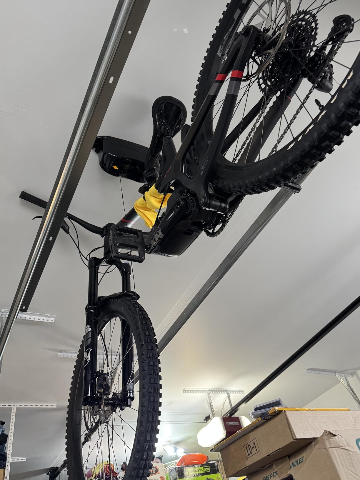 Kradl - Spring-Powered Ceiling Bike Hoist and Rack for Effortless Storage customer photo 1