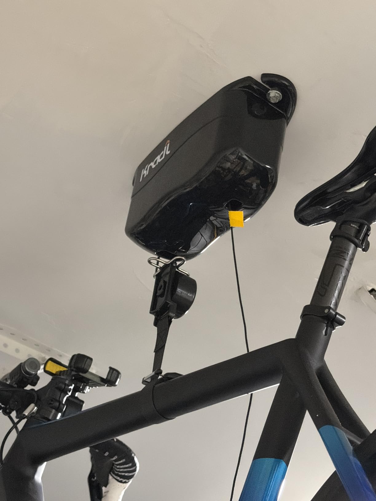 Kradl - Spring-Powered Ceiling Bike Hoist and Rack for Effortless Storage customer photo 2
